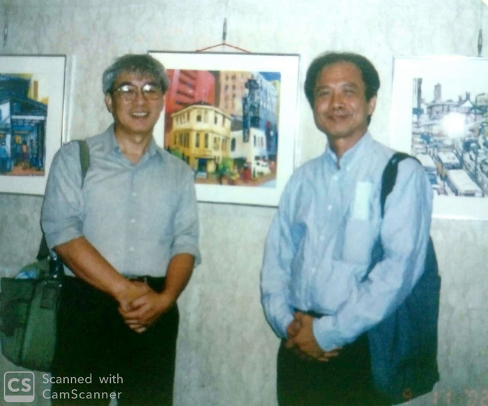 本文作者(右)與曹俊彥合照。